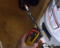 Water Heater – Gas Detected at the Piping Connection Gas supply connection at a water heater where a combustible gas detector responded