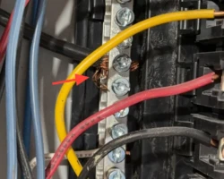Service Panel – Loose and Frayed Conductor Strands Stranded copper conductors at a breaker terminal with loose frayed strands standing out