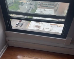 Interior window with a very low sill above the floor and a long drop to the ground outside