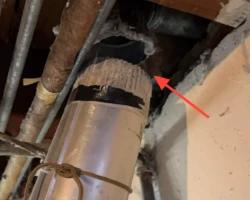 Dryer exhaust duct pulled free of its transition fitting behind a dryer