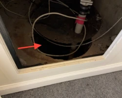 Sump Enclosure – Openings Not Sealed Sump pit with a loose-fitting lid leaving gaps open to the basement