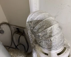 dryer-vent-terminating-in-bucket